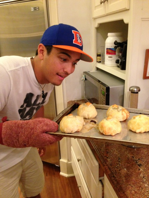 Alex admires his Father's Day creation, Filet Mignon wrapped in puff pastry!
